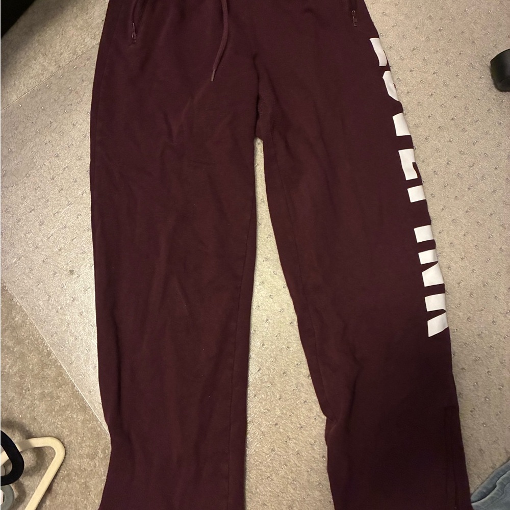 Maroon Sweatpants with White Lettering